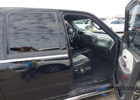 2003 Ford F-150 Lariat z USA, uszkodzony, nr VIN 1FTRW07323KC23526